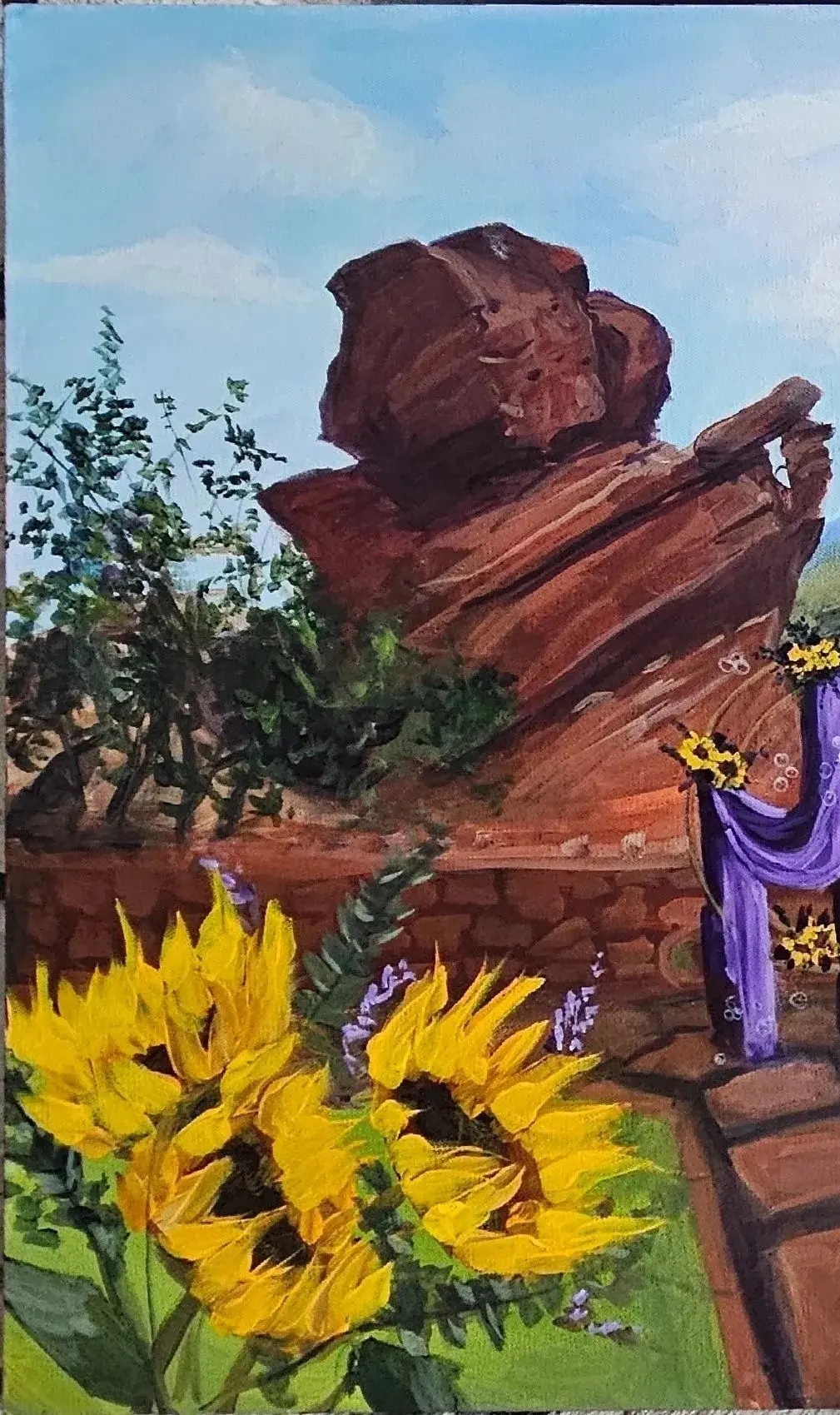 1739558764059_20250212_1401072-814fcea_20_28 A painting of sunflowers and rocks in the desert.